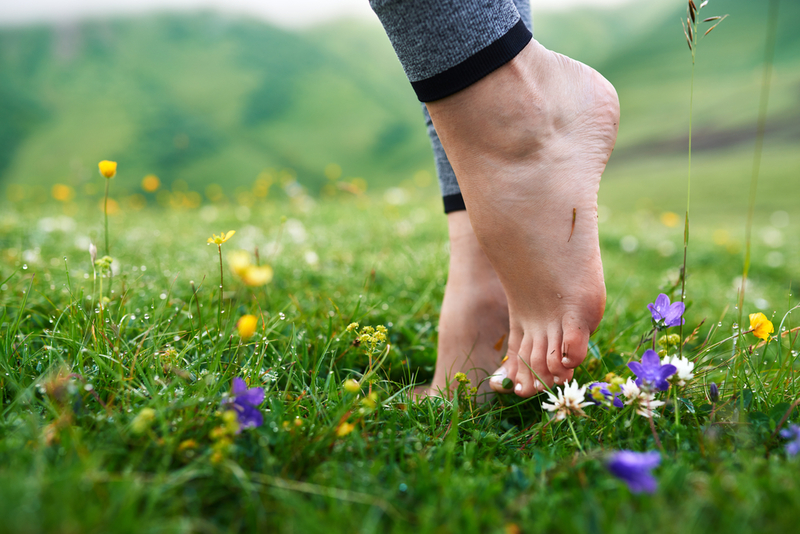 The Science Behind “Earthing” & How We Can Reap Its Benefits | Shutterstock