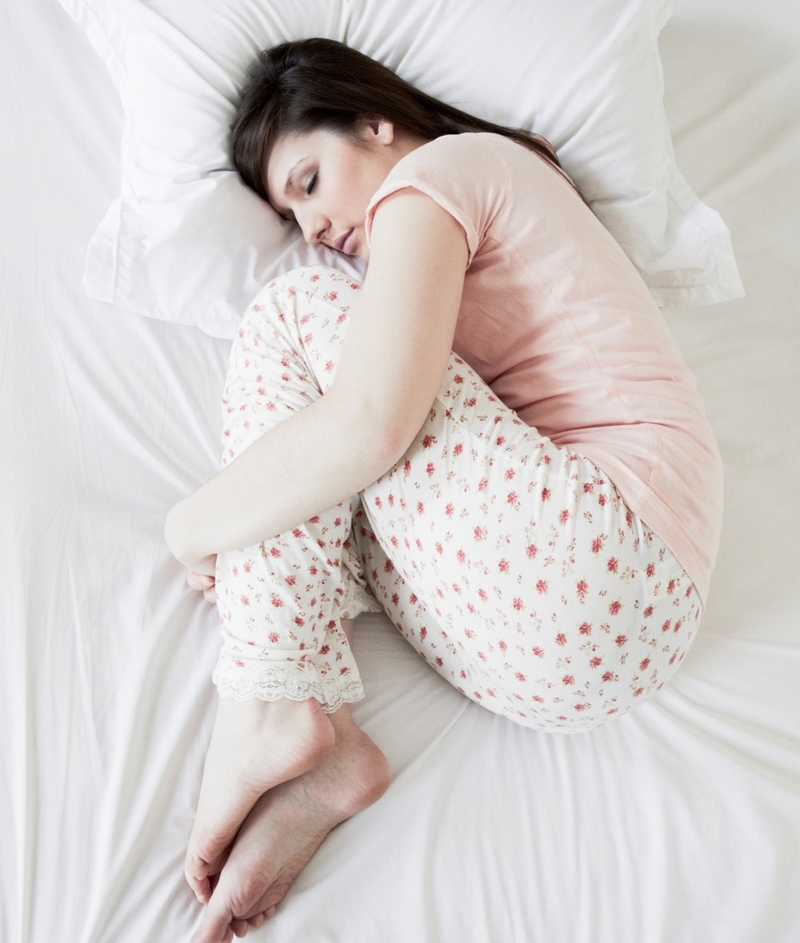 Sleeping in the Fetal Position | Getty Images Photo by Flashpop