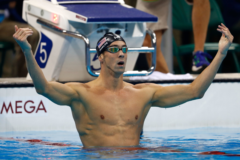 Michael Phelps – 6’4″ | Getty Images Photo by Clive Rose