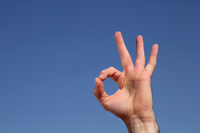 You Give the O.K. Sign in Germany | Shutterstock Photo by Erlo Brown