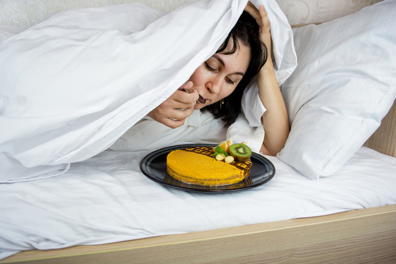 Eating in Bed | Shutterstock