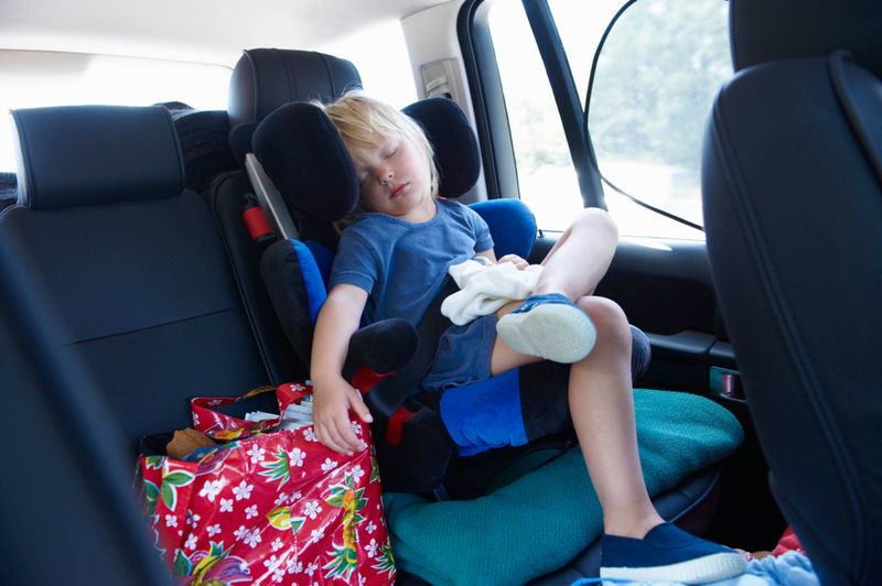 Coloca una sábana debajo del asiento de tus hijos | Alamy Stock Photo