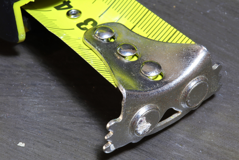 Metal at End of Measuring Tape | Shutterstock