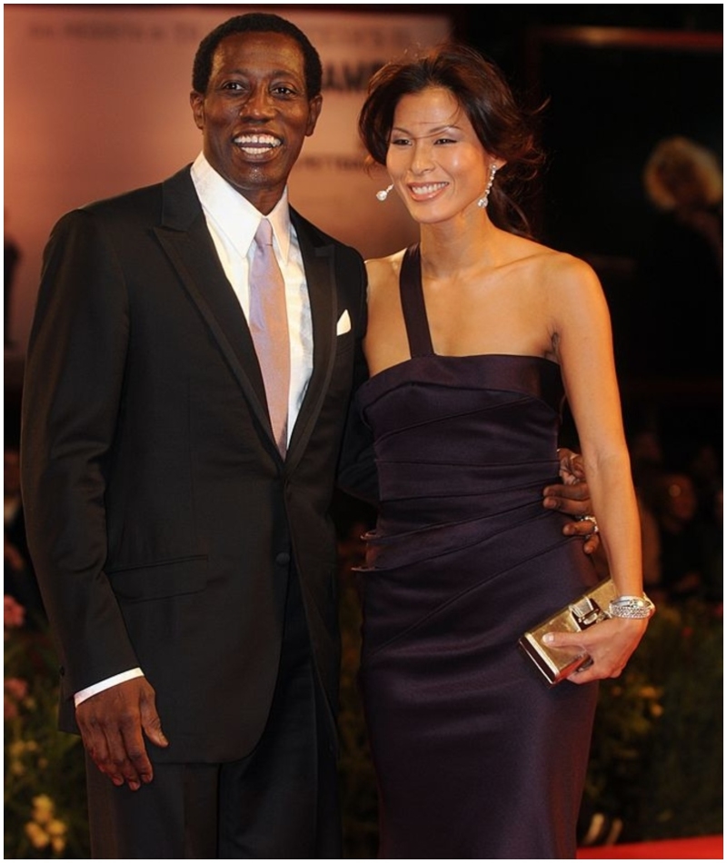 Nikki Park y Wesley Snipes | Getty Images Photo by Pool CATARINA/VANDEVILLE/Gamma-Rapho