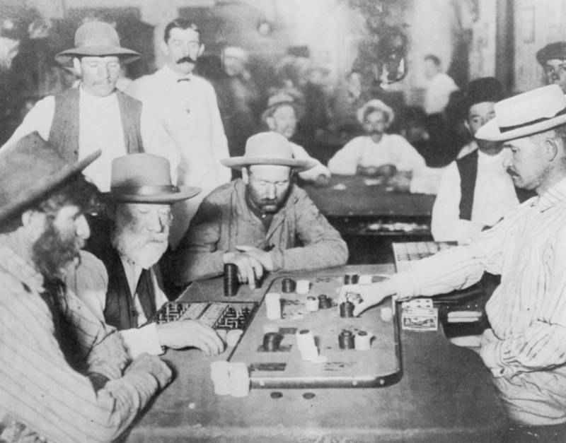 Vaqueros jugando al póker | Alamy Stock Photo by Alto Vintage Images