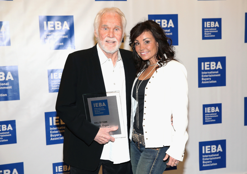 Kenny Rogers and Wanda Miller | Getty Images Photo by Terry Wyatt/Getty Images for IEBA