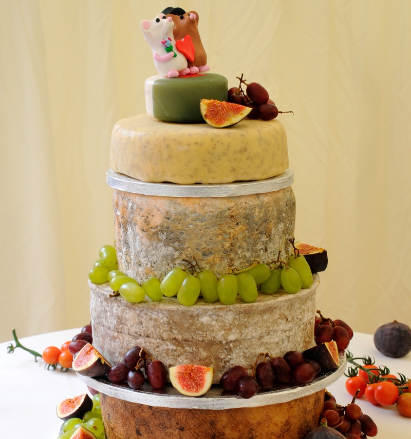 And Now, the Bride Will Cut the Cheese | Alamy Stock Photo