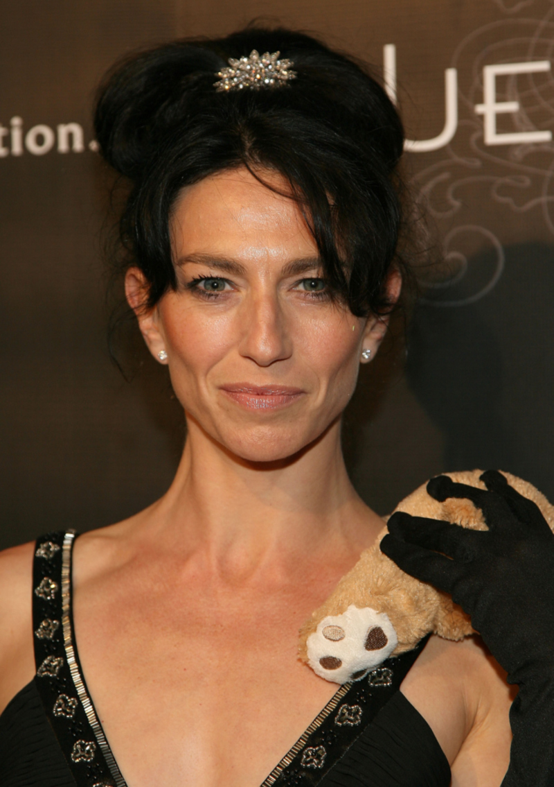 Claudia Black Then | Getty Images Photo By Maury Phillips/Stringer